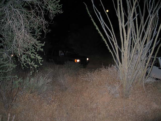 Tedd and Marilyn on the trail in their Disco 2 under a full moon.