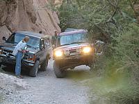 Frank negotiates a tight squeeze thanks to inconsiderate hikers parking their vehicles.