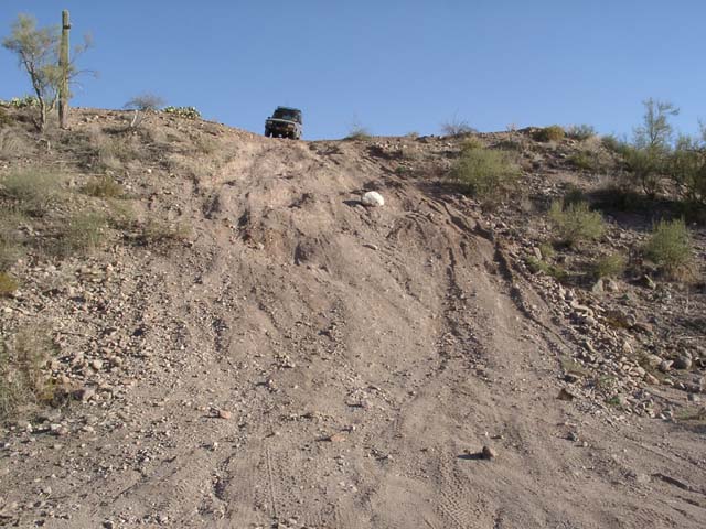 Michael McDonald preparing to go down a hill.   Where did that white rock come from?