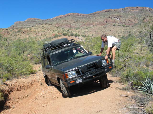 Rob catches a ride on Mike's Discovery.