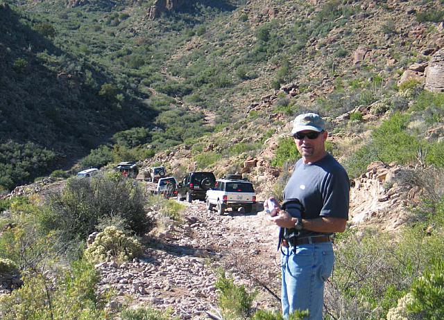 Mike looks on as the trucks wait for something.