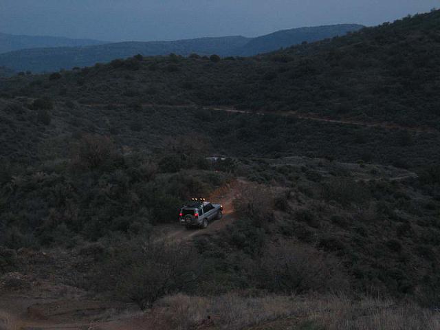 John fires up his Hella's and we make our way in the dusk