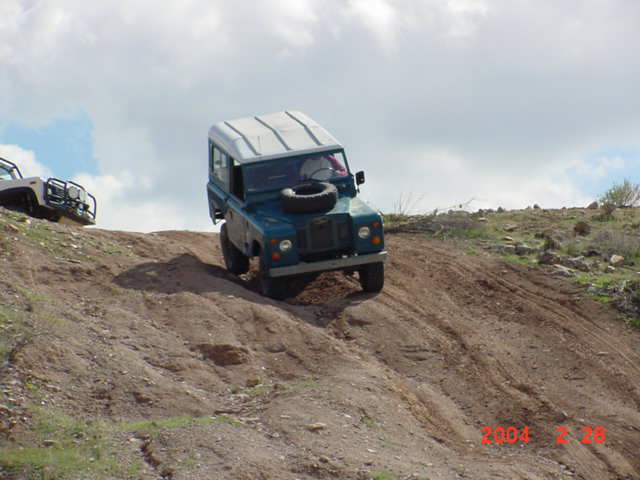 Jess twists his suspension going down the hill.