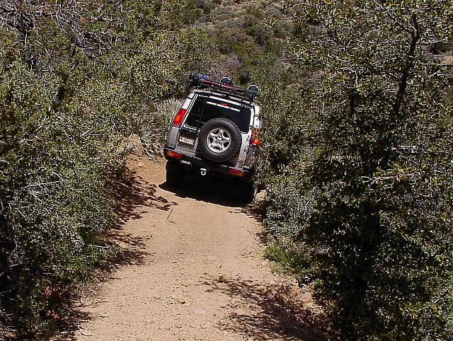 Armando and the group leave the photographer behind