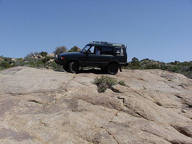 Jon pretends to be in Moab at the top of Reno Pass