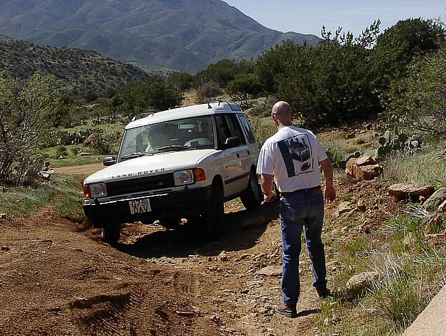 Jon helps spot Robert in a cross axle situation