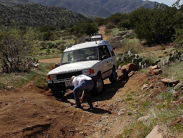 Jon stacks rocks for the small amount of extra traction needed