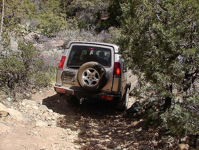 Ziad makes his way through the narrow trail