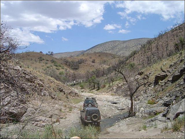 Rovers picking their way through the creek bed