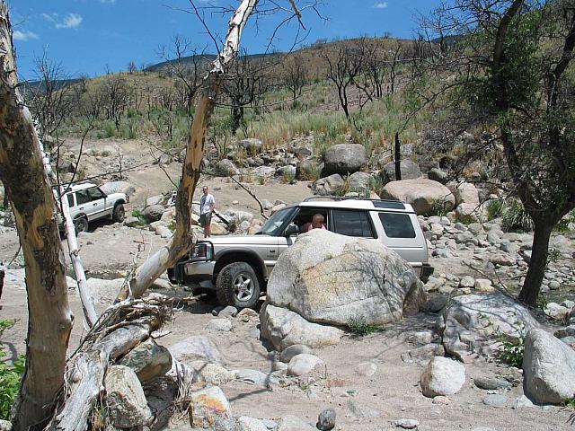 Clay makes his way through the creek bed