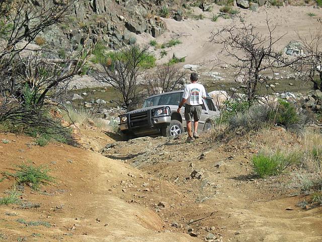 Mike spots Clay over a loose section