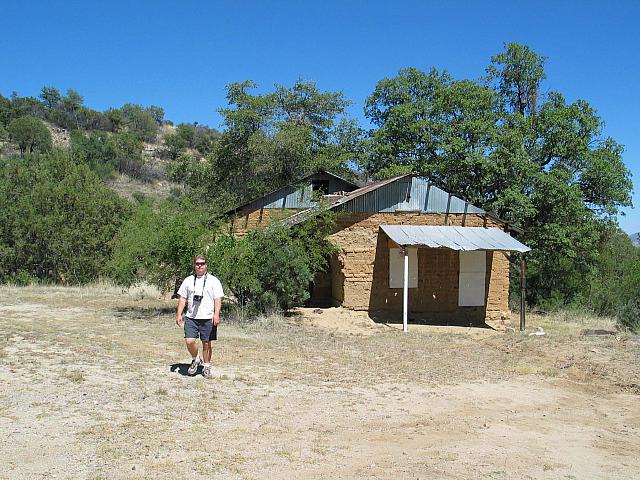 Chad poses in front of an abandoned house in Duquesne
