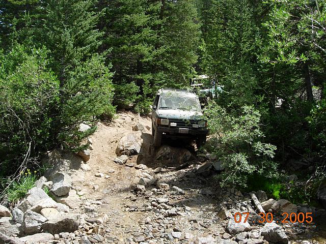 Down the obstacle on Half Moon Lake / Iron Mike Mine trip