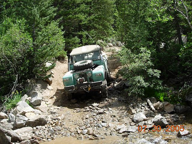 Charlie goes down the obstacle on Half Moon Lake / Iron Mike Mine trip