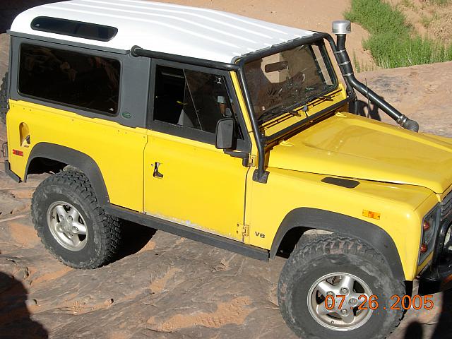 Moab - Poison Spider Mesa  - Rob on top of the Waterfall