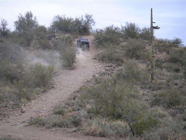 Jon C skinny pedals it up the optional play hill!