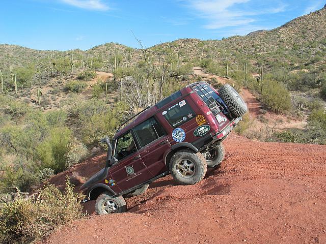 Frank drives down the play hill.