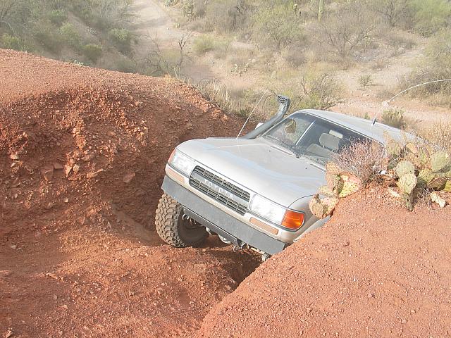 John Shotts drives his Landcruiser up the playhill.