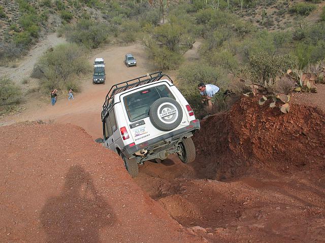 Matt lifts a tire going down the playhill.