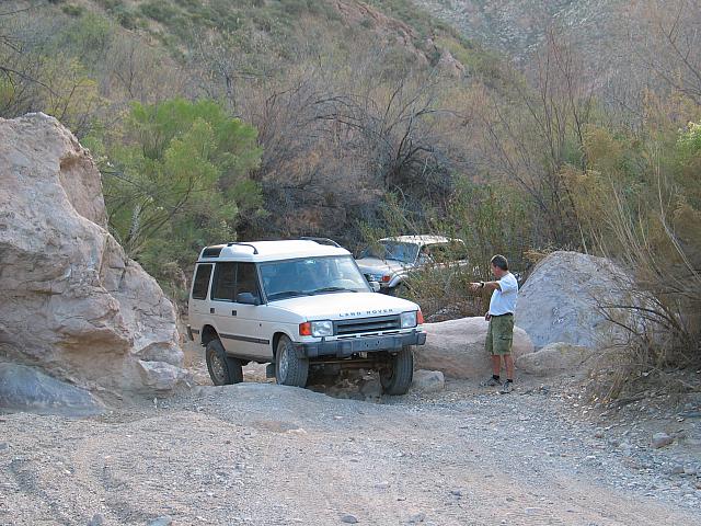 Mike helps Corey past a rock.