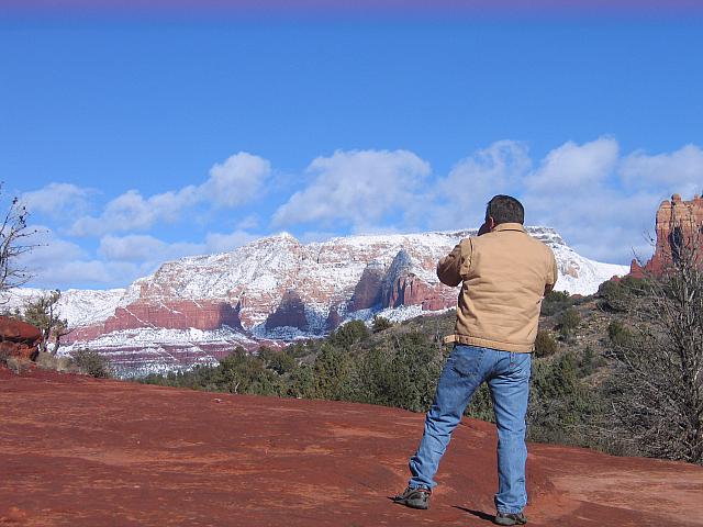 Photo of a Real Man taking a photo