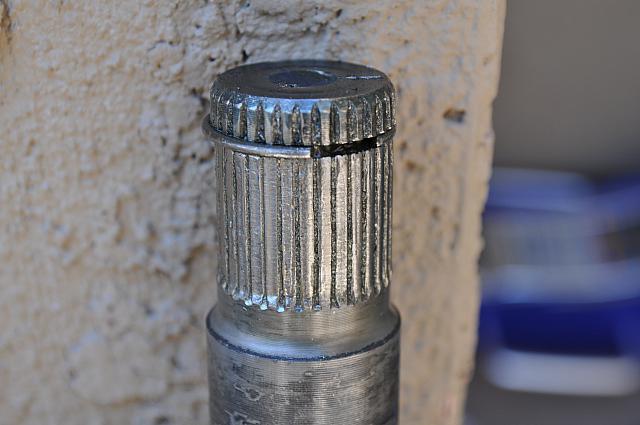 Sheared splines on DII driver side front half shaft, CV end