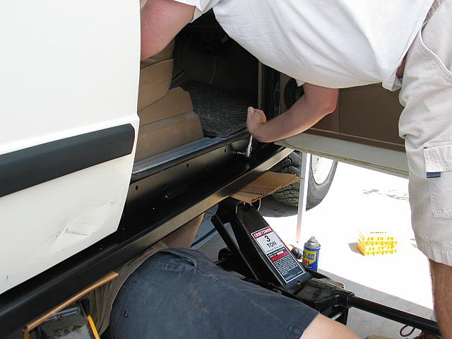 Ted tightens some bolts.