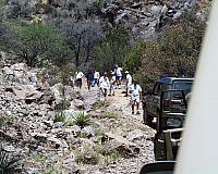 Returning from surveying the climb