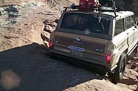 You can see how high the step is as Matt scrapes his rear bumper on departure. He's got 35" tires.