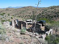 An old building that had a great view from the side of a hill.