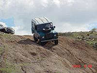 Jess twists his suspension going down the hill.