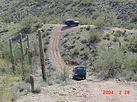 Jess's Series IIa behind Jon's Disco on the trail.