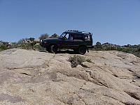 Jon pretends to be in Moab at the top of Reno Pass