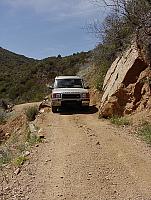 Ziad hugs the hillside