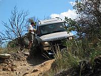 Clay scrapes his slider on a rock during a sharp turn
