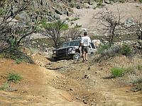 Mike spots Clay over a loose section