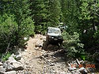 Down the obstacle on Half Moon Lake / Iron Mike Mine trip