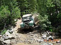 Charlie goes down the obstacle on Half Moon Lake / Iron Mike Mine trip