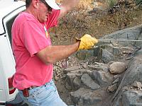 Mike helps reel the winch cable back in.