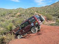 Frank drives down the play hill.